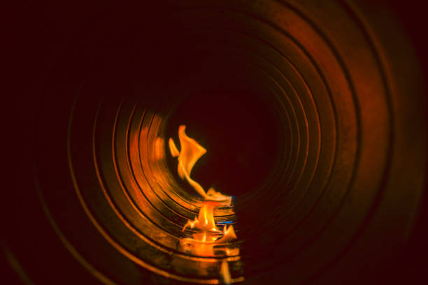 combustion system in an open supply fire in a spiral-wound air duct, front and back background blurred with bokeh effect