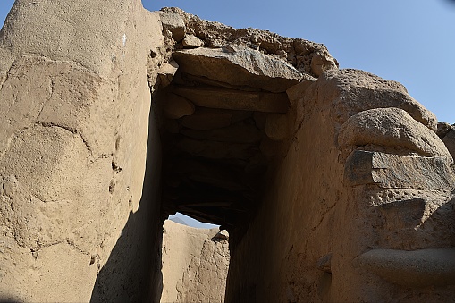 Huaycán de Cieneguilla is an Archaeological Zone, a small treasure located in the eastern part of the city of Lima.
 in foreground,Rough-hewn stones forming the entrance to an ancient passage