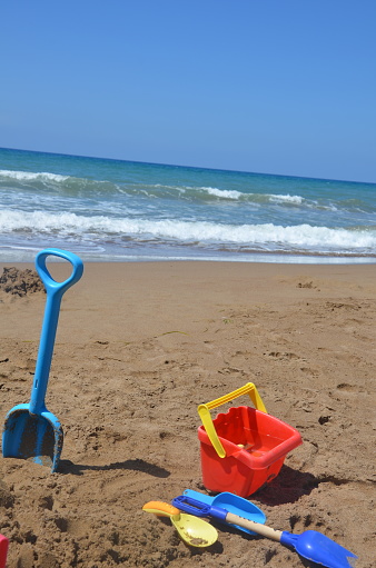 Picture of a fantastic natural wild beach with kids sand toys