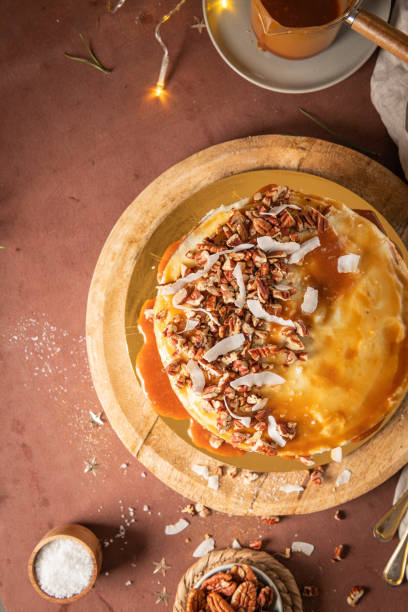 istock Delicious caramel cake with pecan nuts and coconut flakes 1910142534