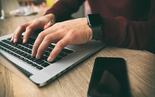istock A young man is working on his laptop 1910294286