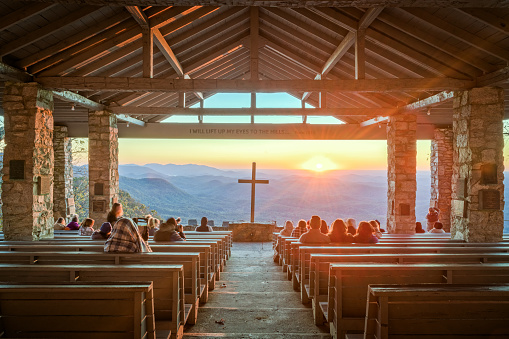 Cleveland, South Carolina, USA - November 2, 2020: Visitors enjoy Pretty Place Chapel at dawn. Officially named as “Fred W. Symmes Chapel,” it dates from 1941.