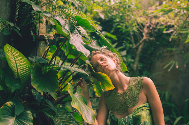 istock young woman merges with nature 1910311124