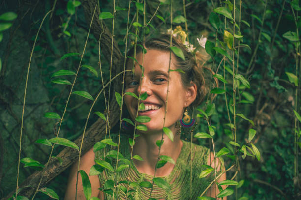 istock young woman merges with nature 1910311125