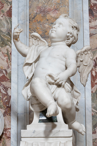 Naples - The marble baroque statue of angel in the church Chiesa di Sant'Anna dei Lombardi.