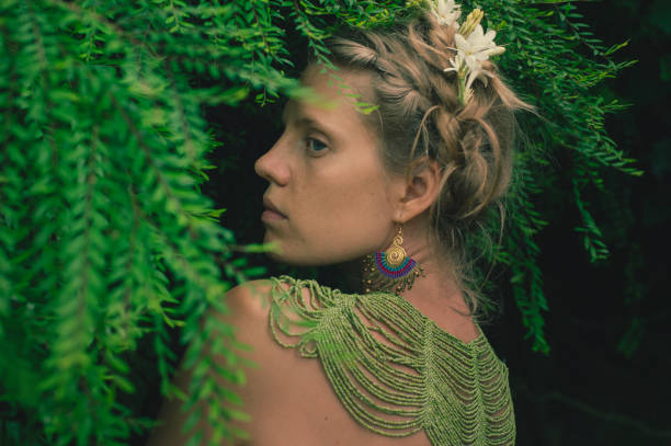 istock young woman merges with nature 1910318004