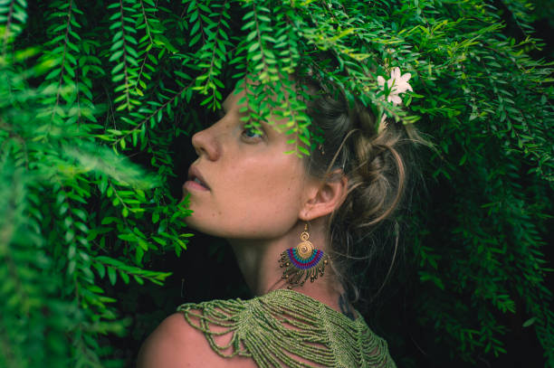 istock young woman merges with nature 1910319573