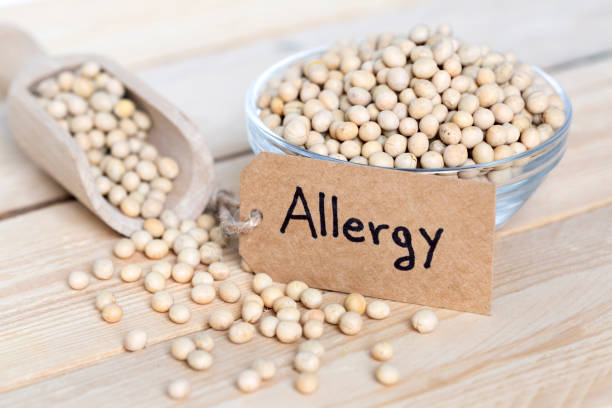 bowl of soy with label that says "allergy" stock photo