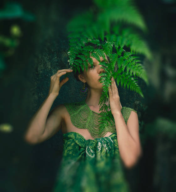 istock young woman merges with nature 1910320102
