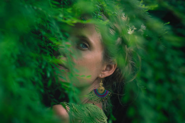 young woman merges with nature