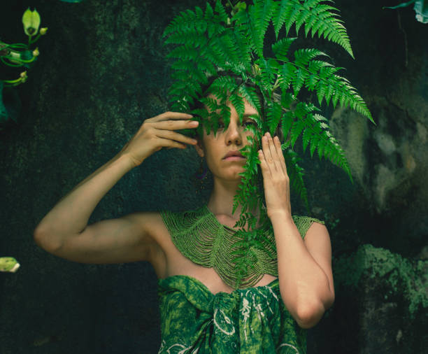 istock young woman merges with nature 1910322344