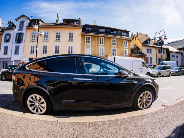 tesla model x suv car parked street wide angel lens - capital letter flash imagens e fotografias de stock