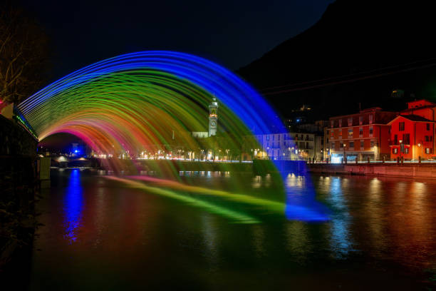 Illuminated water jets in rainbow colors