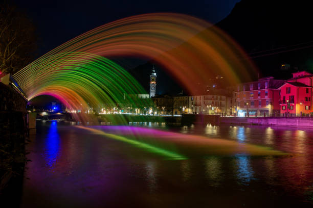 Illuminated water jets in rainbow colors