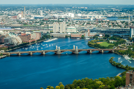 An aerial view of Boston displays the beauty of this city. The Longfellow Bridge connects one part of the city to another.