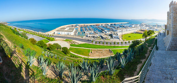 Panorama of the fishers port, marina and gardens, from the lookout and walkway in the door Bab Bhar, in the kasbah in the Medina of Tangier, Morocco