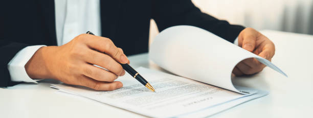 istock Business executive signing contract agreement document. Shrewd 1910530690
