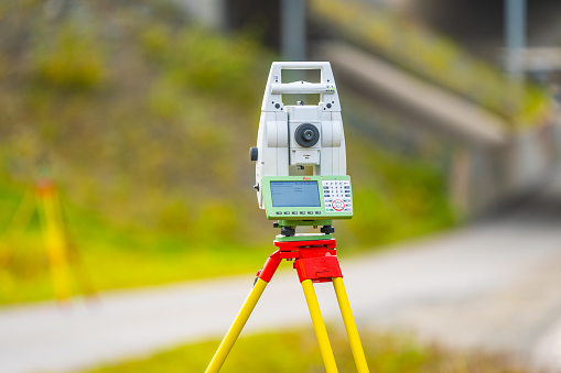 Gothenburg, Sweden - October 26 2023: Leica TS16 P3 automated surveying station in the field.