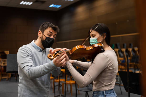 istock How to hold the violin & bow 1910594576