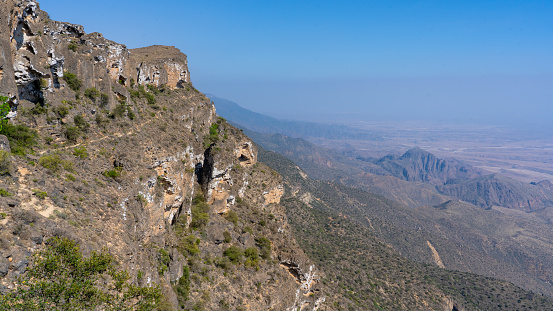 view of Jabal Samhan with majestic mountain range that offers a breathtaking escape into the heart of Oman's wilderness.