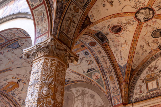 Wall frescoes of rich decorated courtyard of Palazzo Vecchio in Florence Wall frescoes of rich decorated courtyard of Palazzo Vecchio in Florence, Italy medieval fresco stock pictures, royalty-free photos & images