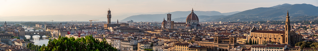 Skyline of downtown Florence during sunset, seen from the famous Piazzale Michelangelo, Italy