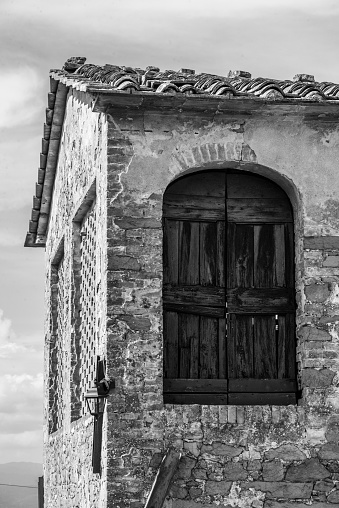 Door of an old shed in a Tuscan village, Italy