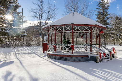 Scenic view of gazebo in snowy winter landscape at Christmas time