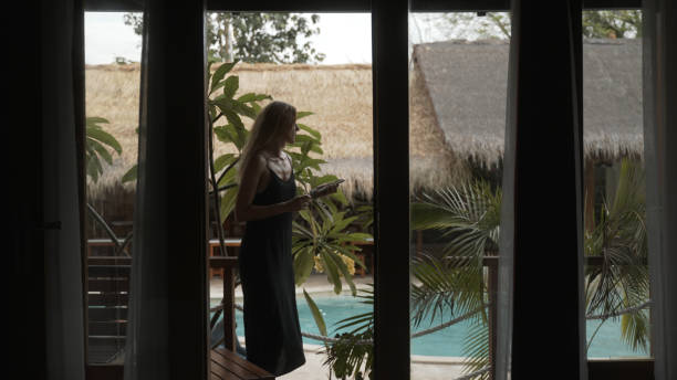 istock Young woman relaxes in resort 1910813838