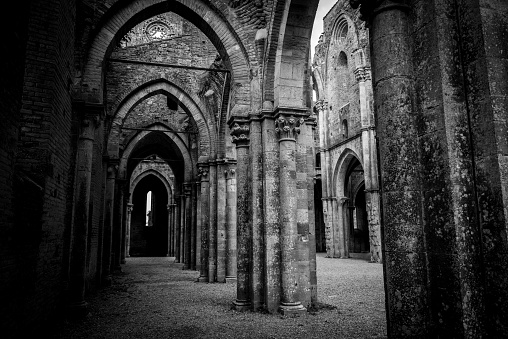 Nave of the ruined and abandoned Cistercian monastery San Galgano in the Tuscany, Italy