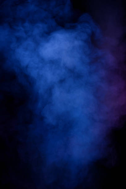 istock Blue and purple steam on a black background. 1910914783