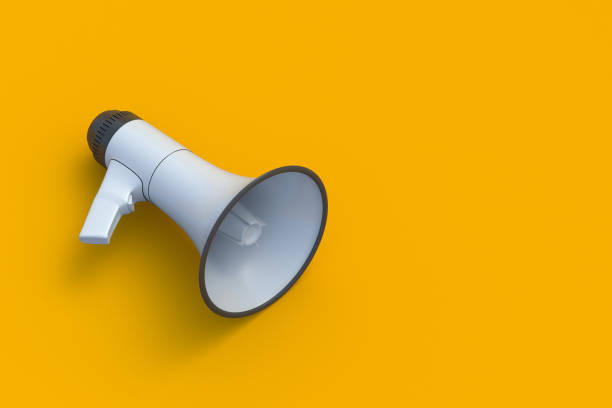 istock Megaphone on yellow background. Advertising and distribution. Announcing a new event. Inspirational speech. Call for protest. Danger warning. Discount and sale concept. Copy space. 3d render 1910915916
