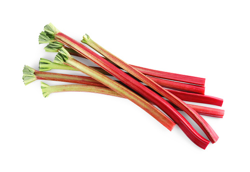 Fresh rhubarb stalks isolated on white, top view