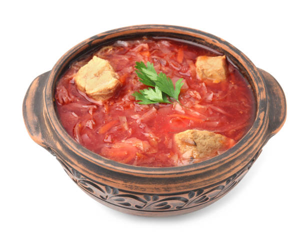 istock Tasty borscht in bowl isolated on white 1910931838