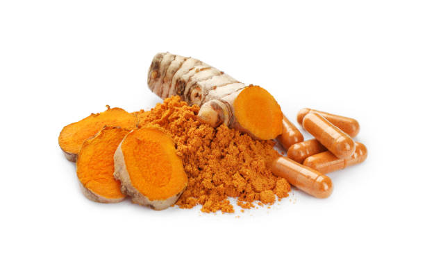 istock Aromatic turmeric powder, pills and raw roots isolated on white 1910940603