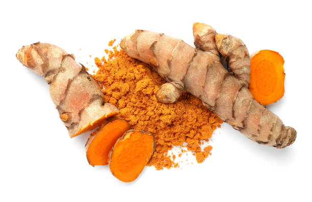 istock Aromatic turmeric powder and raw roots isolated on white, top view 1910941786