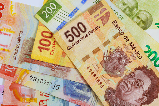 Mexican currency in form of banknotes bills denominations of 500, 200, 50, 20 pesos.