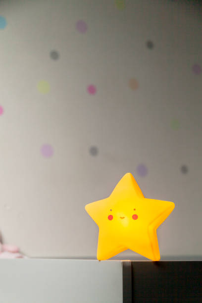 istock Decorative star with colorful balls background 1910990586