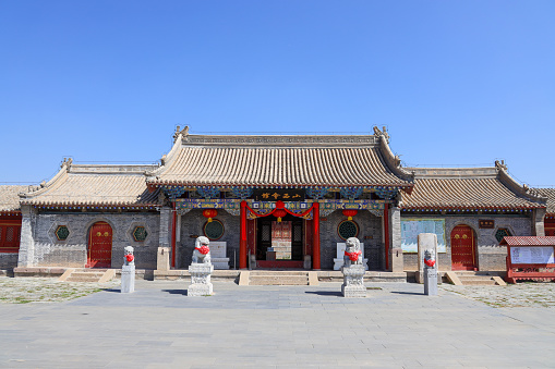 Architecture and scenery around gyeonghuigung palace with the entrance and the pathway to the main courtyard.