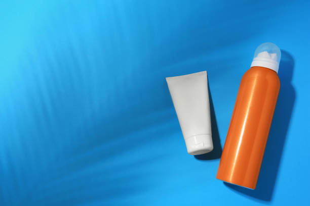 istock Sunscreens on light blue background, flat lay and space for text. Sun protection care 1911018855
