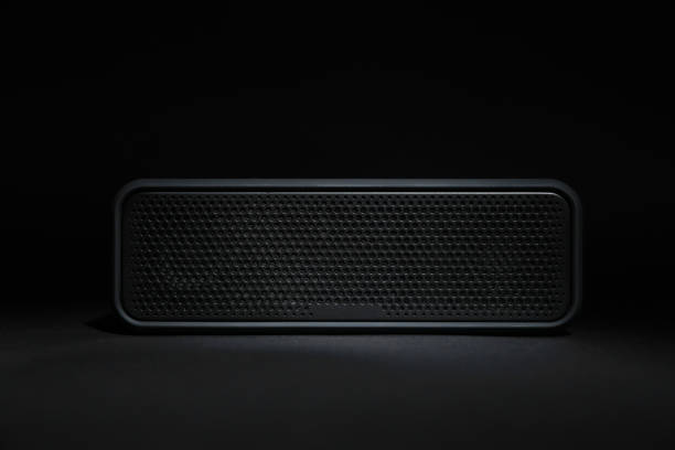 istock One portable bluetooth speaker on black background. Audio equipment 1911045944