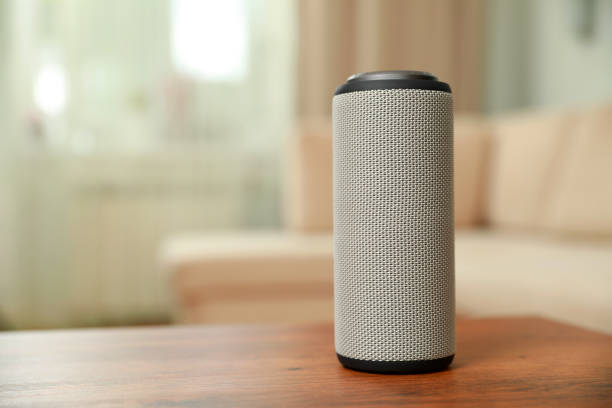 istock Portable bluetooth speaker on wooden table indoors, space for text. Audio equipment 1911046726