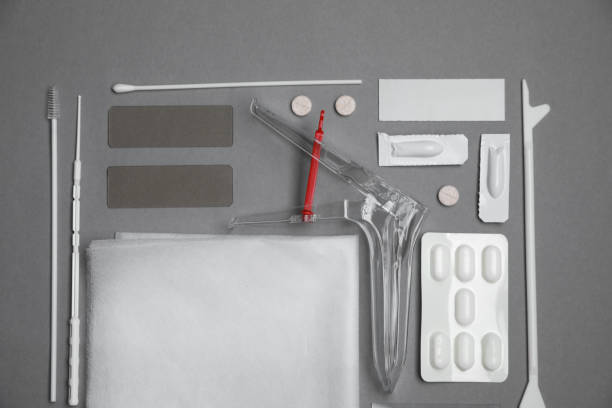 istock Sterile gynecological examination kit and medicaments on grey background, flat lay 1911065807