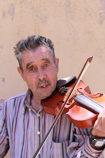 Street Violinist making a living in Barcelona