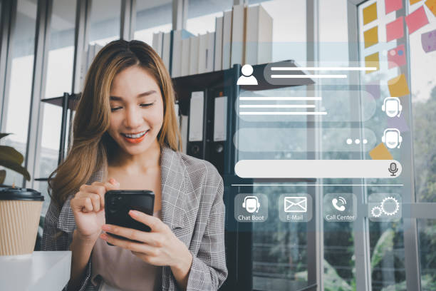 istock Person use customer service and support live chat with chatbot and automatic messages, Artificial intelligence, and CRM software technology. AI Chatbot smart digital customer service application. 1911163247