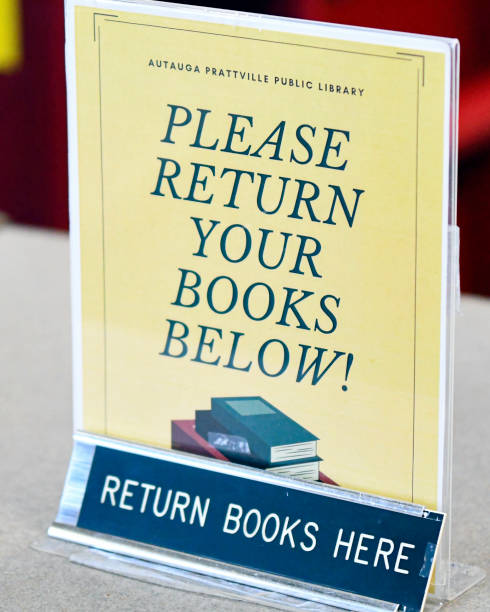 Prattville, Alabama, USA-Dec. 11, 2023: Close-up of book return sign at the Autauga-Prattville Public Library.