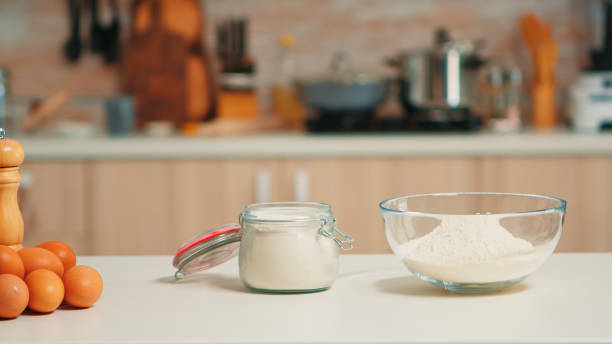 istock Bowl of wheat flour on table 1911278598