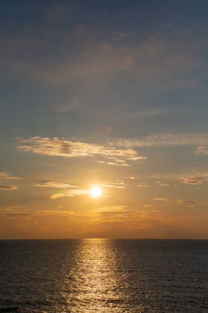 istock The sea at sunset reflecting the sunlight 1911350821