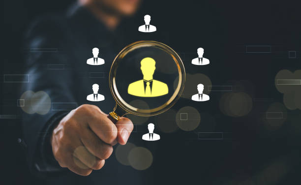 istock Customer Relationship Management CRM concept. Human Resource HR, network structure hiring target. Business employee management, people recruitment technology. Businessman use magnifier search human 1911393197