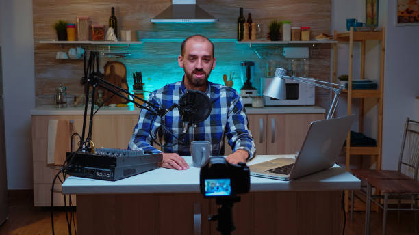 istock Man sitting at recording station 1911411756